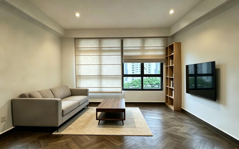 Elegant white fabric blinds installed in a modern room