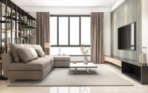 Modern living room featuring floor-to-ceiling neutral curtains.