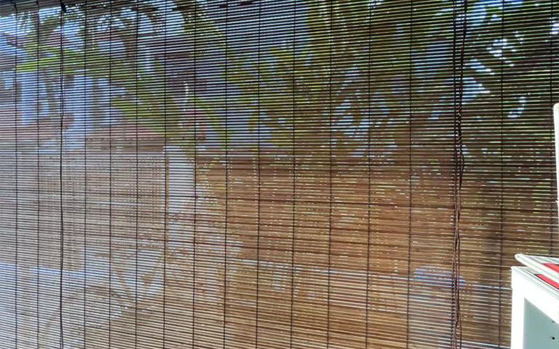 A close-up of traditional bamboo blinds